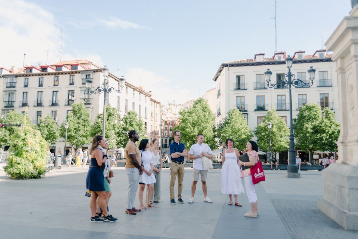 A group of people in Madrid on a spring day.