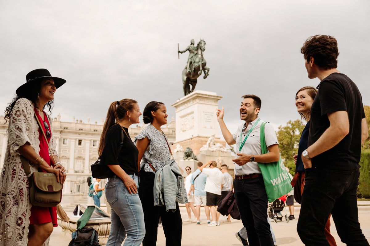 A group of tourists in Madrid's Plaza Mayor